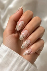 16. Tiny Wildflower White Nail Art