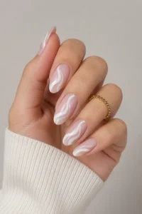 27. White Swirl Nail Art