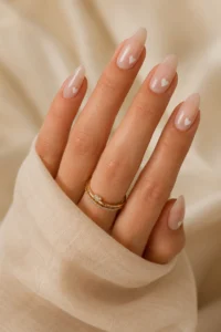 29. Tiny White Heart Nail Designs