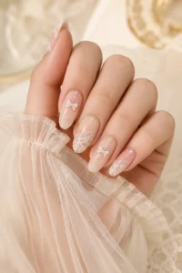 32. White Coquette Nail Art