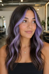 33. Lavender Face-Framing Pieces on Cool Brunette Hair