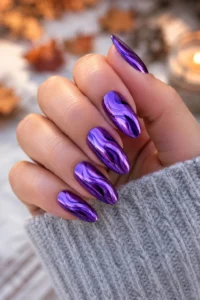 10. Purple Chrome Swirl Nails