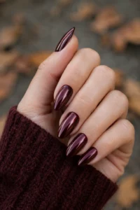 9. Burgundy Chrome Almond Nails