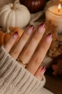 11. Burgundy Aura French Tips