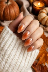 25. Rust Orange Aura Nails