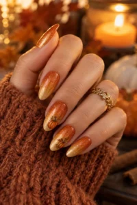 17. Shimmer Pumpkin Ombre Nails