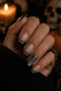 14. Skeleton Hand French Tips