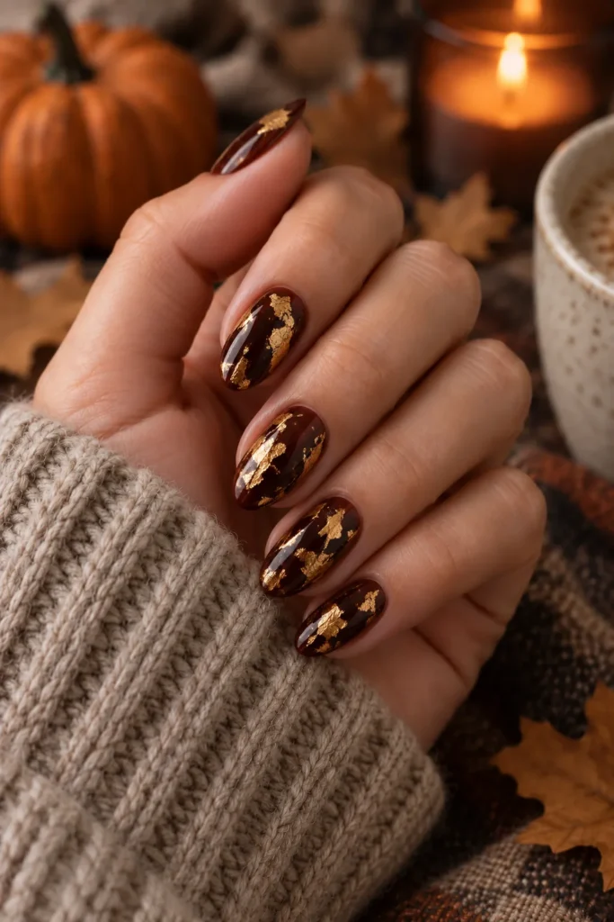 21. Gold Foil Almond Nails