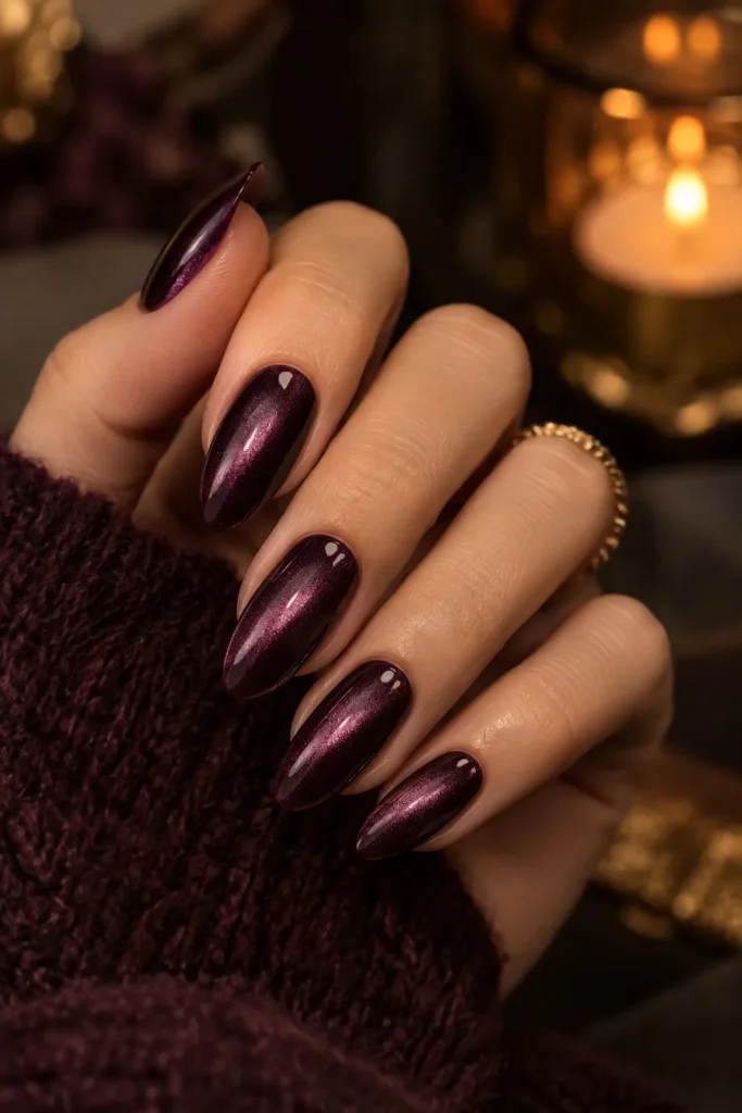 6. Deep Plum Cat Eye Nails